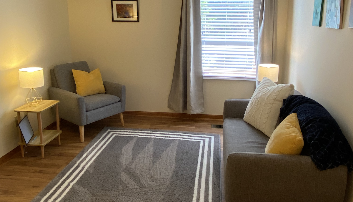 Anne's office in Lawrence, Kansas A photograph of the waiting area in Anne's space, showing a sofa and a chair